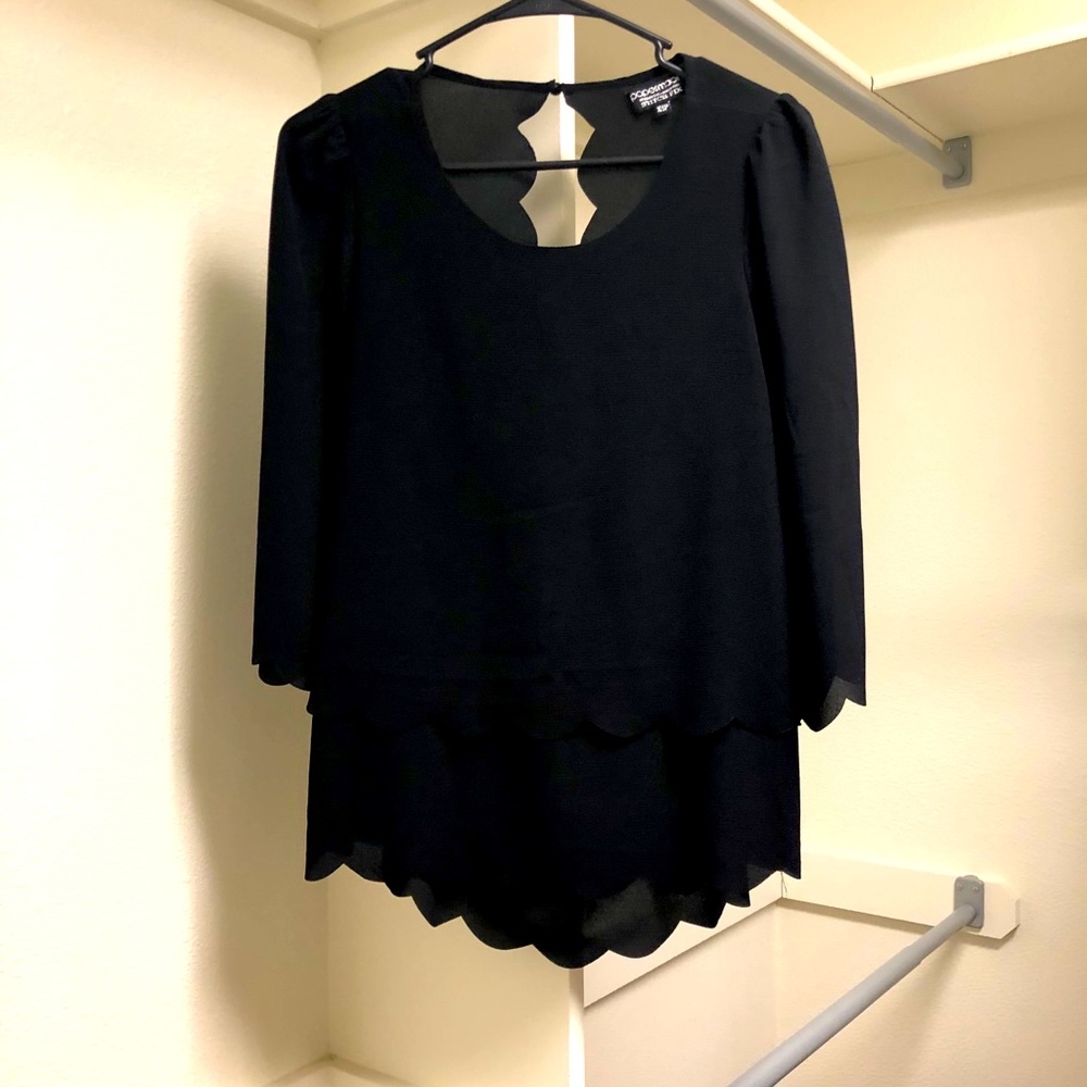 Scalloped black blouse